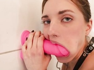 Teenage breezy is blowing a thick rosy hump fucktoy that's stuck to a wall